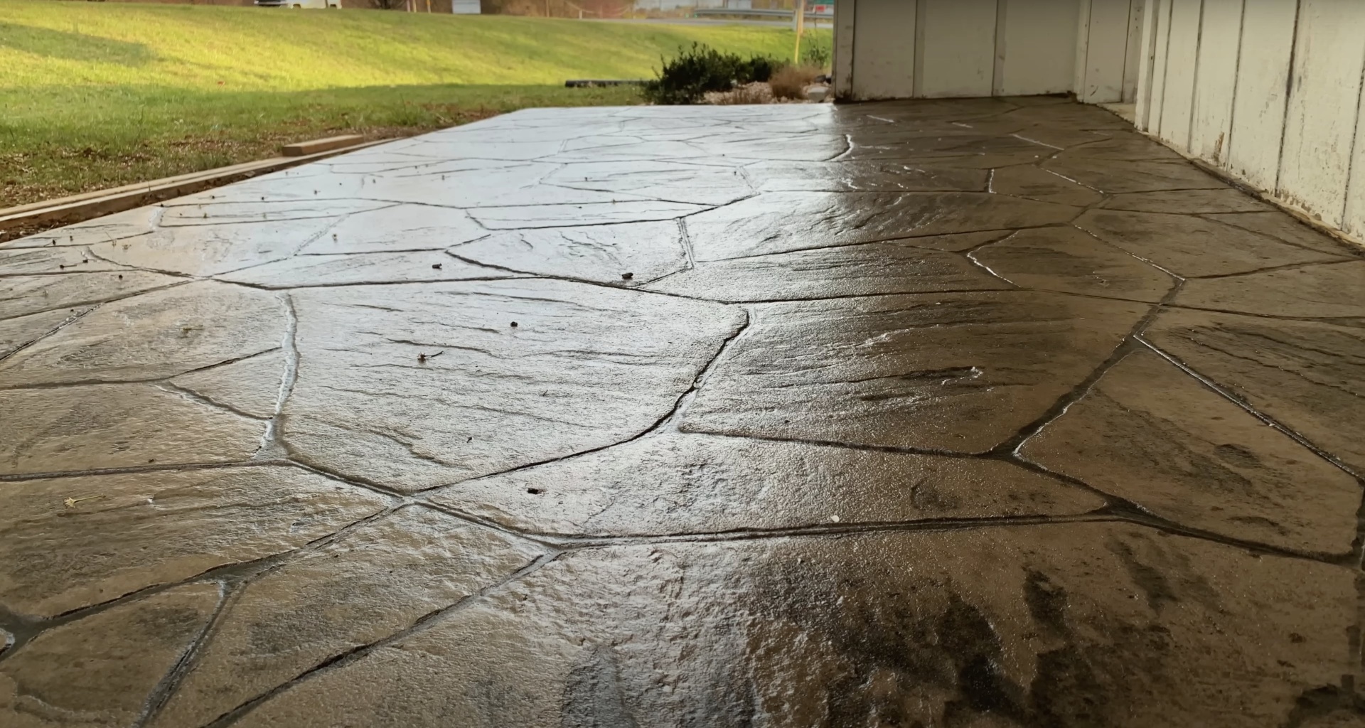 Cracked concrete driveway showing need for professional concrete repair and resurfacing services