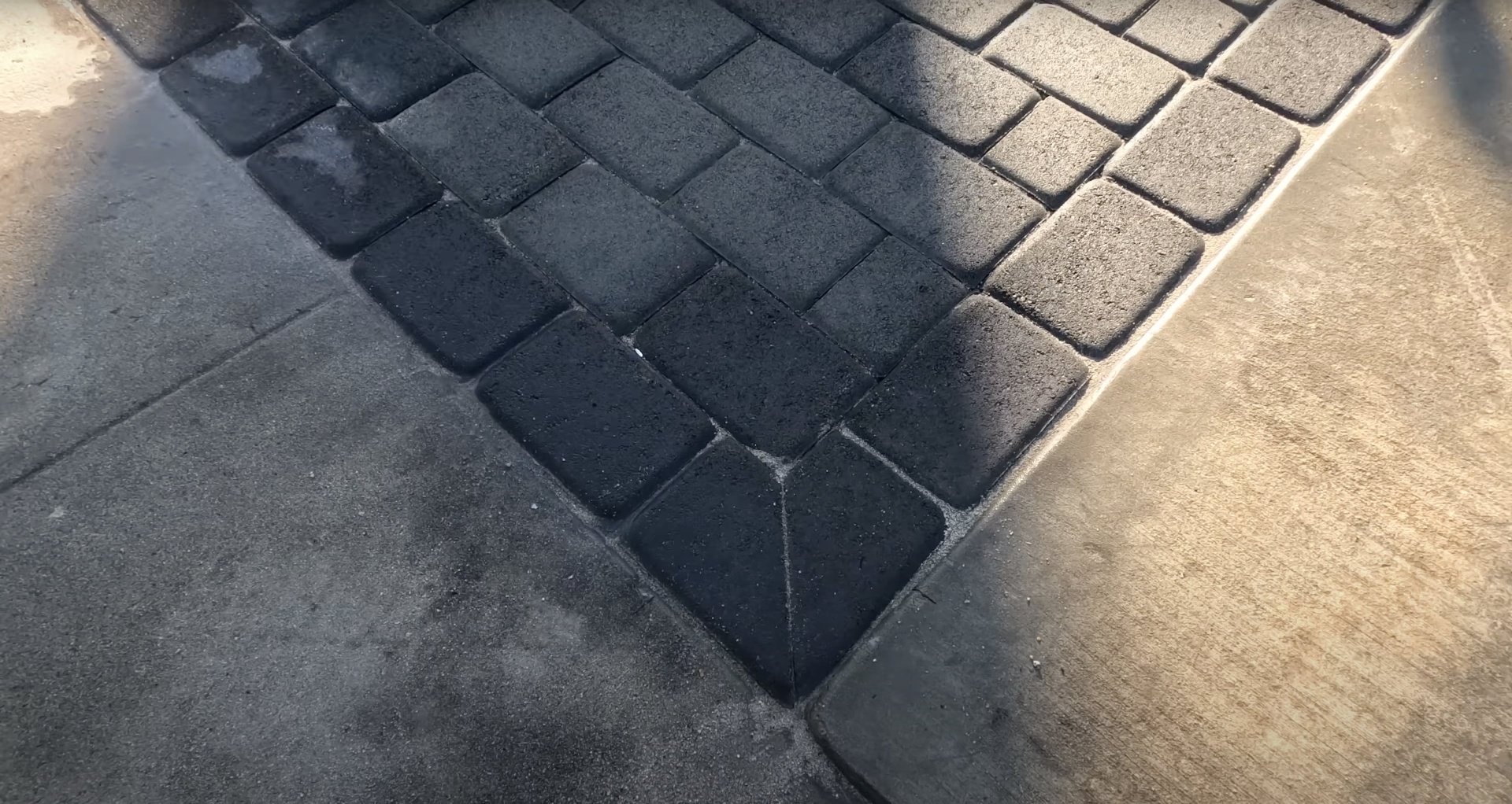 Detailed view of premium interlocking concrete pavers showing quality craftsmanship and precise installation